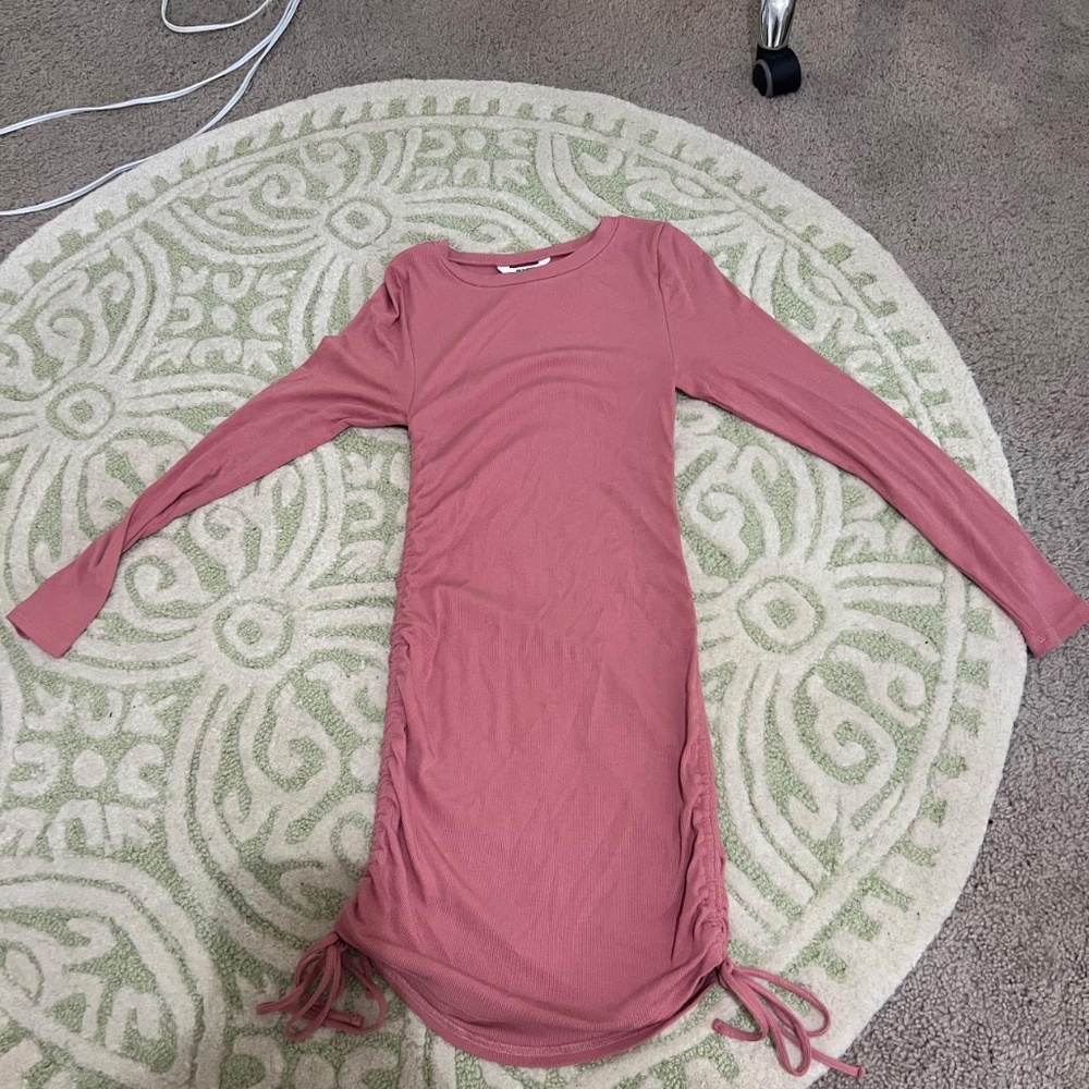 Size small pink Steve Madden long sleeve body con mini dress with ruching on bot